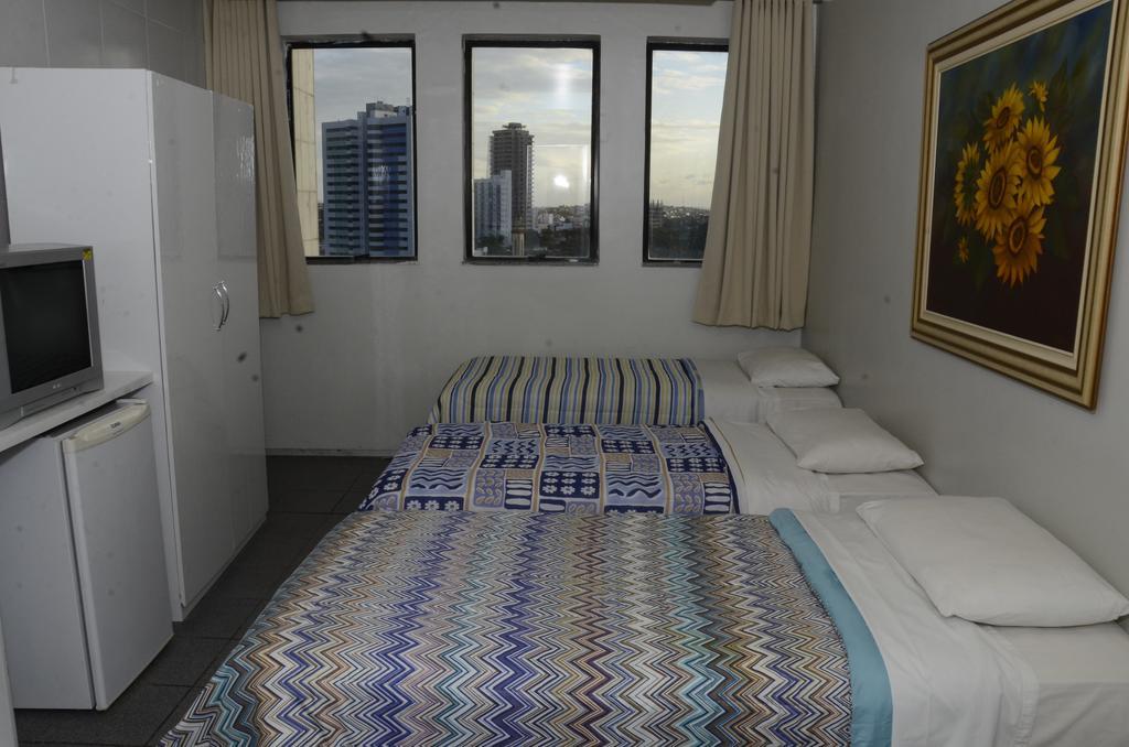 Titao Plaza Hotel กัมปีนากรันเด ห้อง รูปภาพ